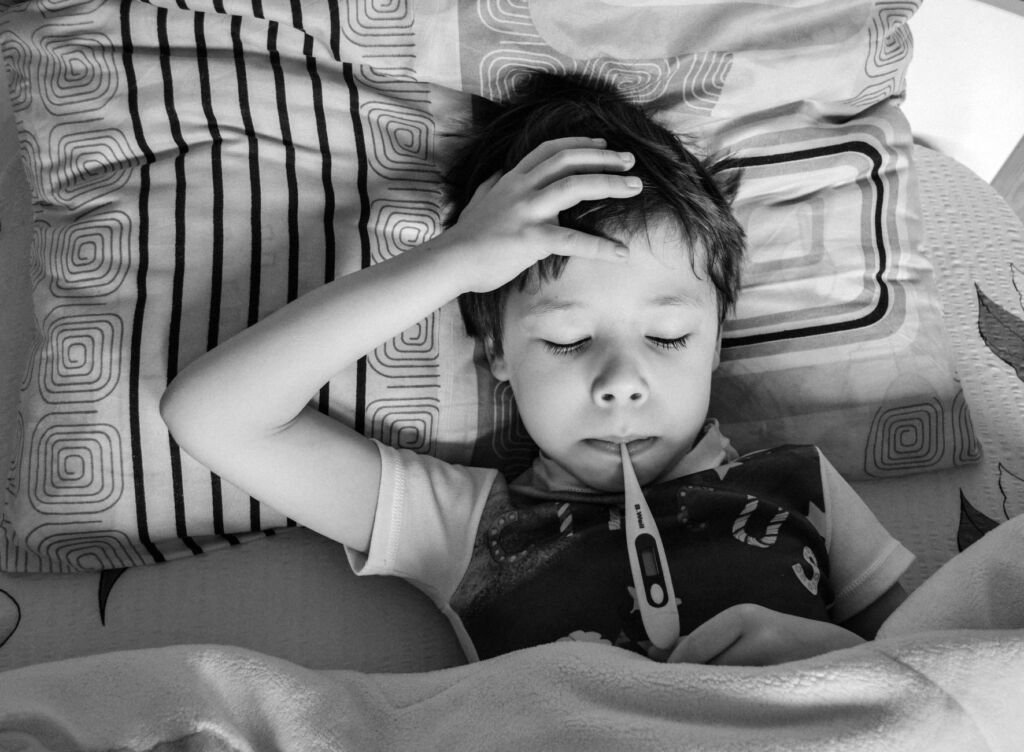 A baby resting comfortably while experiencing a fever