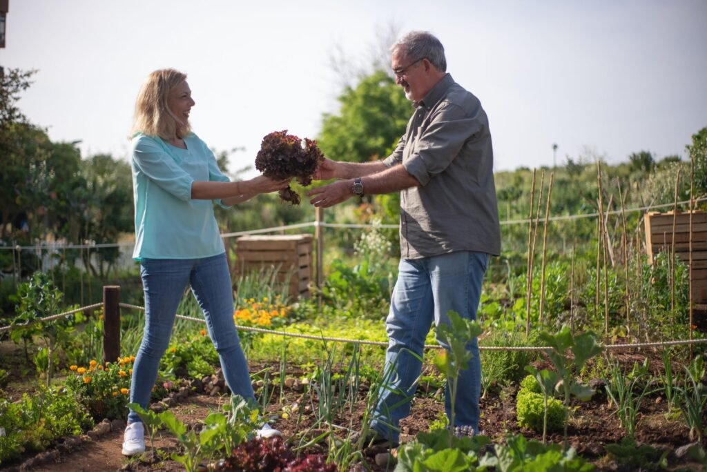 A couple nurturing a garden, symbolizing growth and preparation for family life