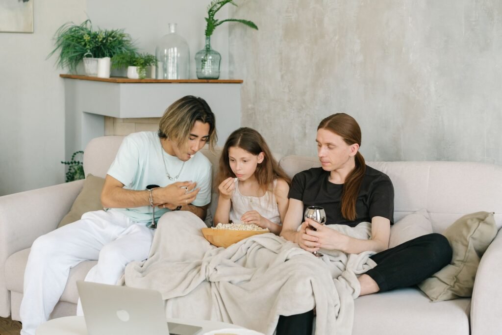 A cozy setup and a shared bowl of popcorn make family movie night feel special