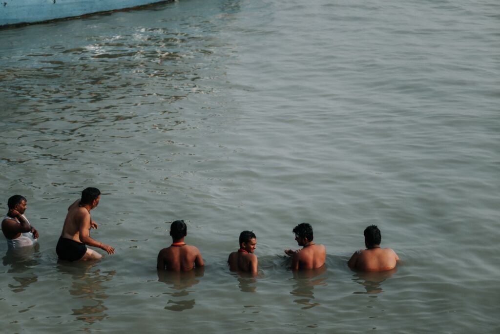 A family enjoying time together in the water, reinforcing safety and joy