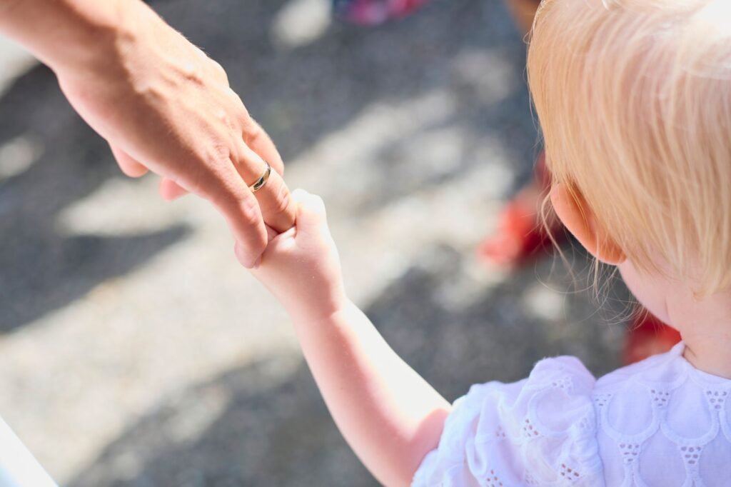 A family walking together and holding hands