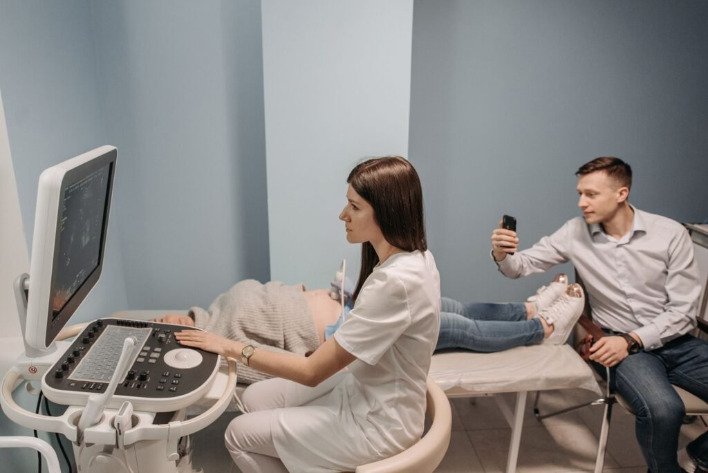 A warm and welcoming scene of expecting parents discussing with their doctor