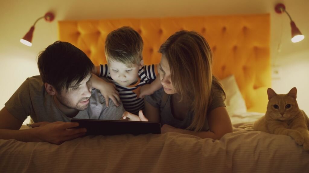Parents providing comfort to their child during a nighttime wake-up