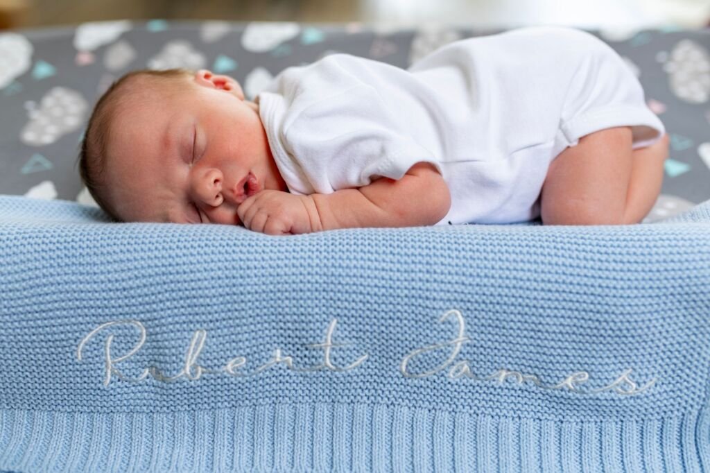 A collection of popular baby names displayed on a table