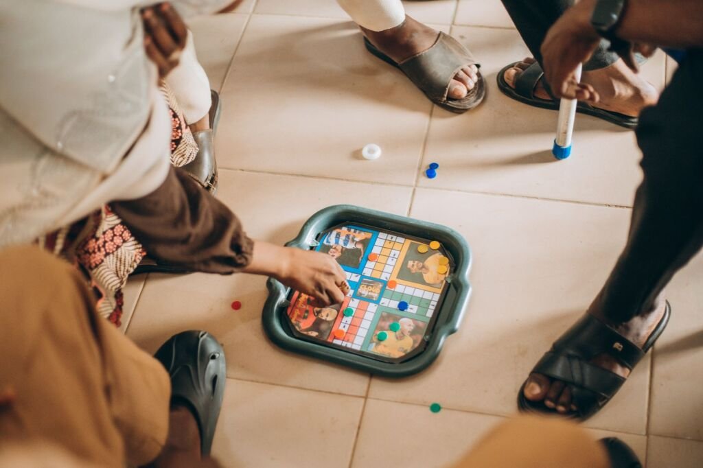 A family gathered around a table, enjoying board games together