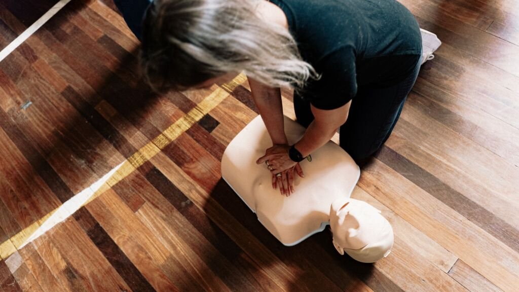 A family practicing CPR together to ensure safety preparedness