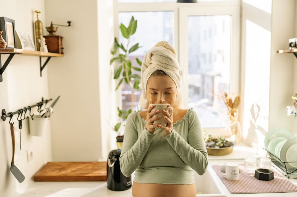 A mom savoring a cup of tea while enjoying some peaceful moments