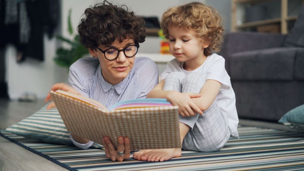 A parent reading an age-appropriate book to their child about reproduction